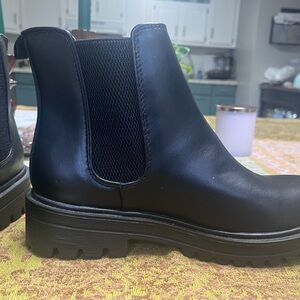 Sleek Black Leather Combat Boots